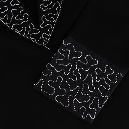 Noura abaya closeup